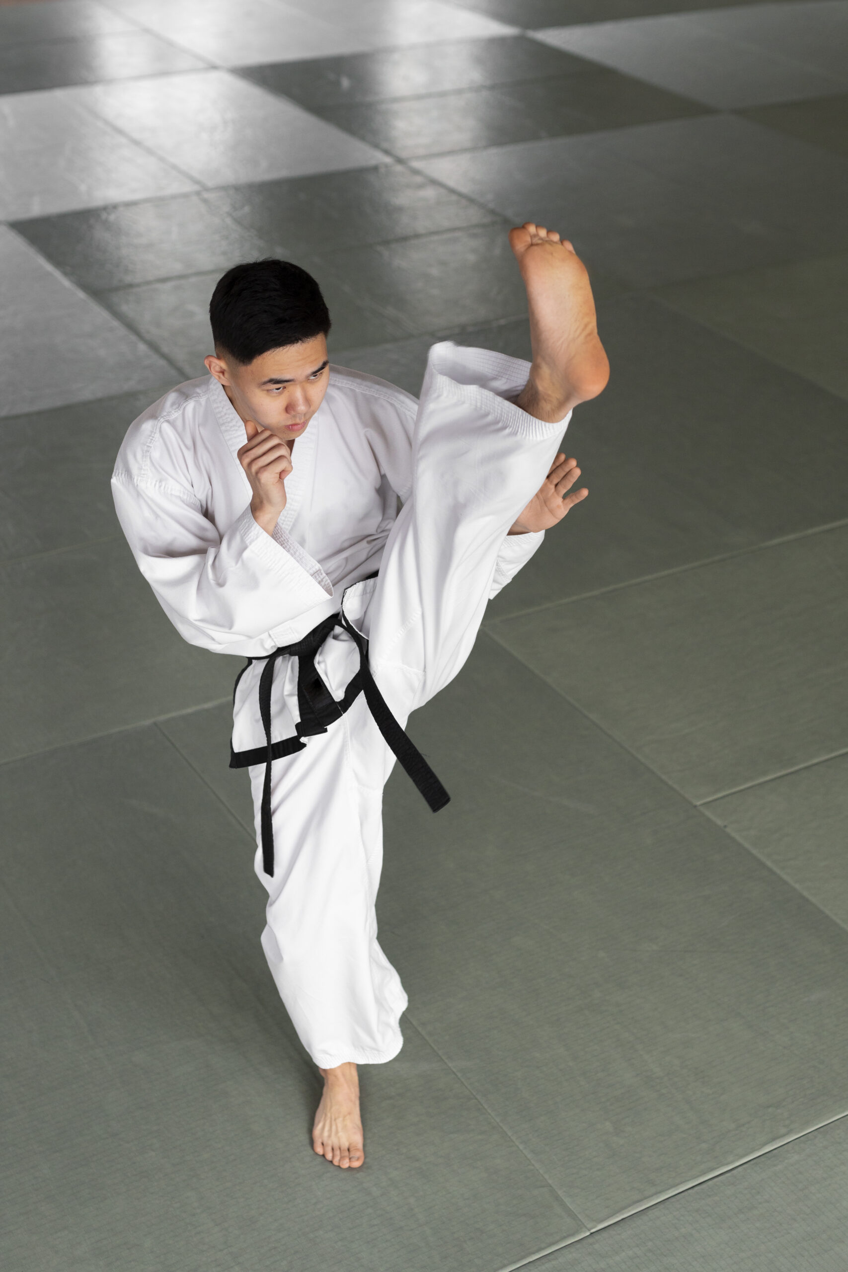 full-shot-teen-practicing-taekwondo